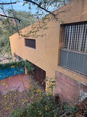 Maison  Carrer rosselló 32. Casa a reformar de 131m2 con garaje y amplios espacios.