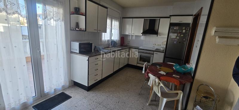 Foto fdaa3162-c4bb-409a-8ef0-b71af2e66d3a. Maison jumelée avec cheminée chauffage parking dans Manlleu