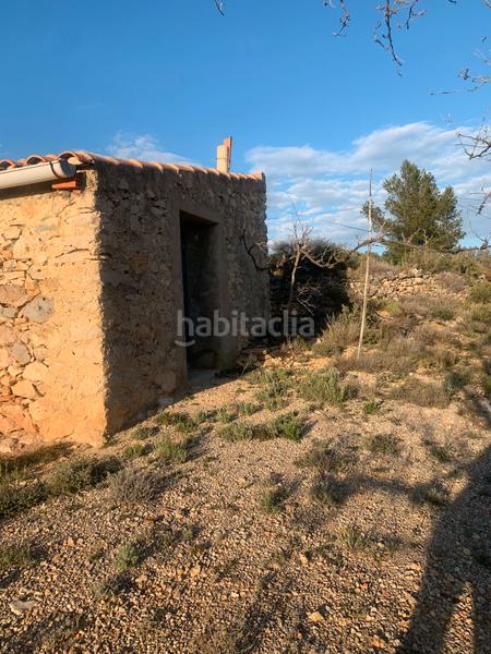 Foto 4b82ce62-ba44-43fc-96fc-528421f5406b. Bauernhof mit kamin in Sierra Engarcerán