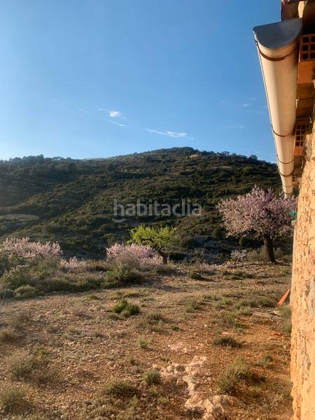 Foto 5d35fc14-86fd-4e37-a8d5-fd981bb1d6f3. Bauernhof mit kamin in Sierra Engarcerán