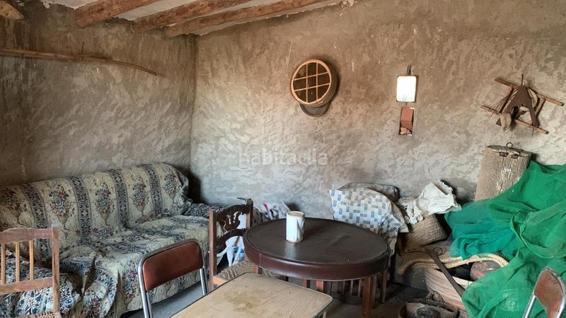 Foto 70b346c4-f3fd-43d1-91ea-a3c4f475ba93. Bauernhof mit kamin in Sierra Engarcerán