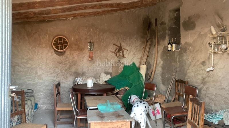 Foto e06ba499-902e-4ec0-9521-ca87f85a4324. Bauernhof mit kamin in Sierra Engarcerán