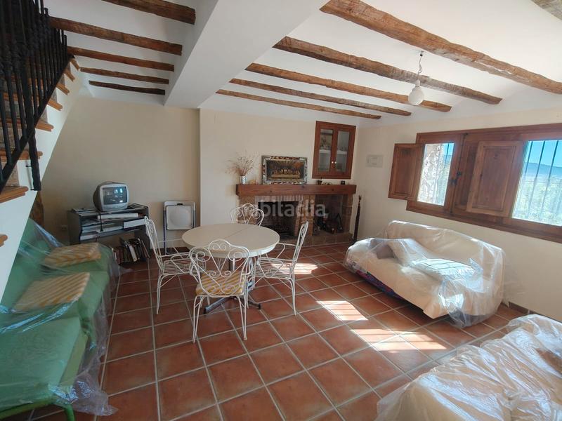 Foto 24d35c0f-b29e-4cb1-8078-cb9b861b551f. Casa amb xemeneia aparcament a Culla