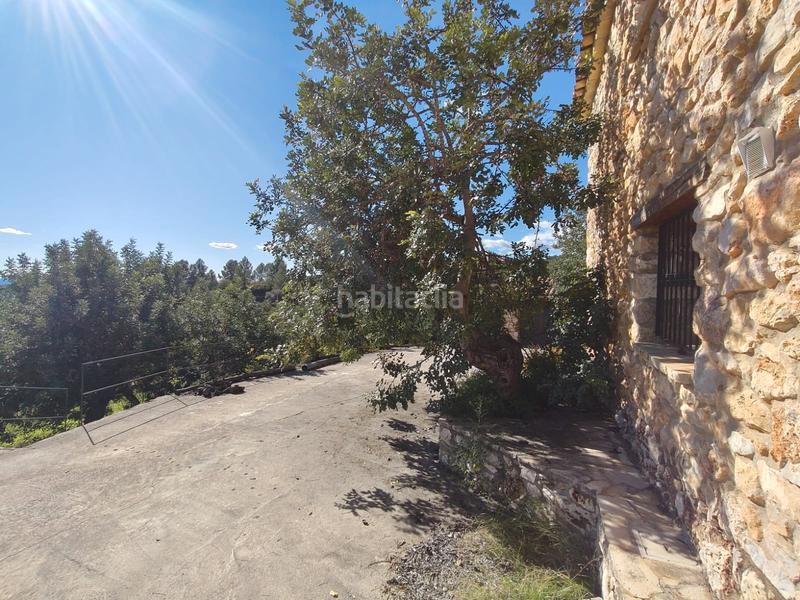 Foto ed9a6d1f-965f-4ea1-aad1-fd7f16e9c502. Casa amb xemeneia aparcament a Culla