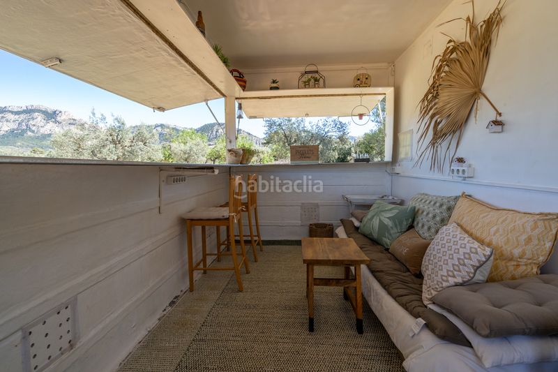 Foto e157f823-4a4b-46d6-b665-22fbc5f53ccf. Finca rústica en raval dels àngels 18 finca rústica con olivos y frutales. agua de riego de pozo propio. construcción metálica. en Horta de Sant Joan