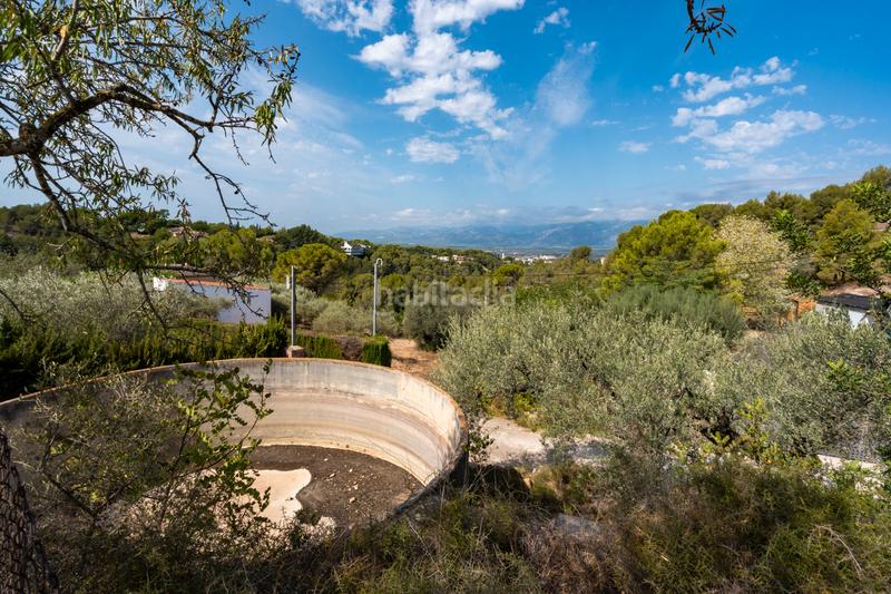 Foto d3279f9a-b3cc-4394-94db-5d585cd3dc5f. Terreno residencial finca urbana con una balsa cerca en Tortosa