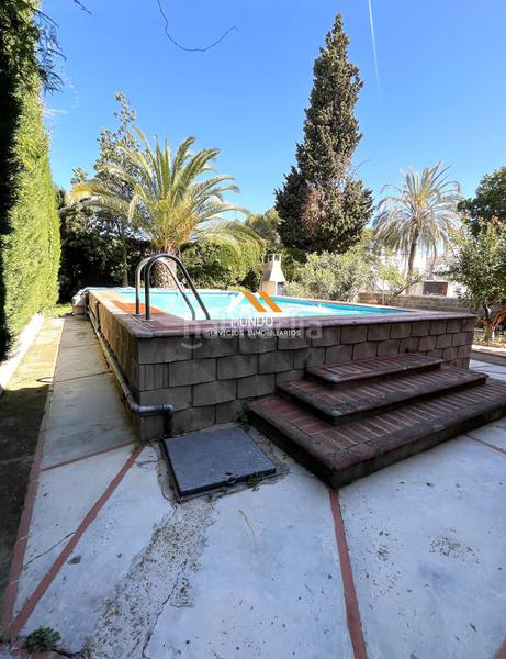 Foto f70b6293-b4ee-4351-b04a-d13dc6f128d2. Chalet con riscaldamento parcheggio piscina in La Cañada Paterna