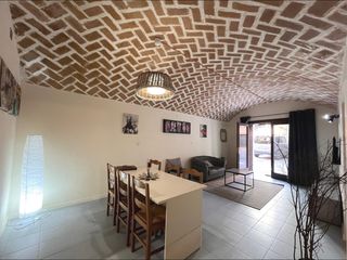 Flat  Carrer francesc cambo. Planta baja totalmente reformada en verges, a un paso de lescala