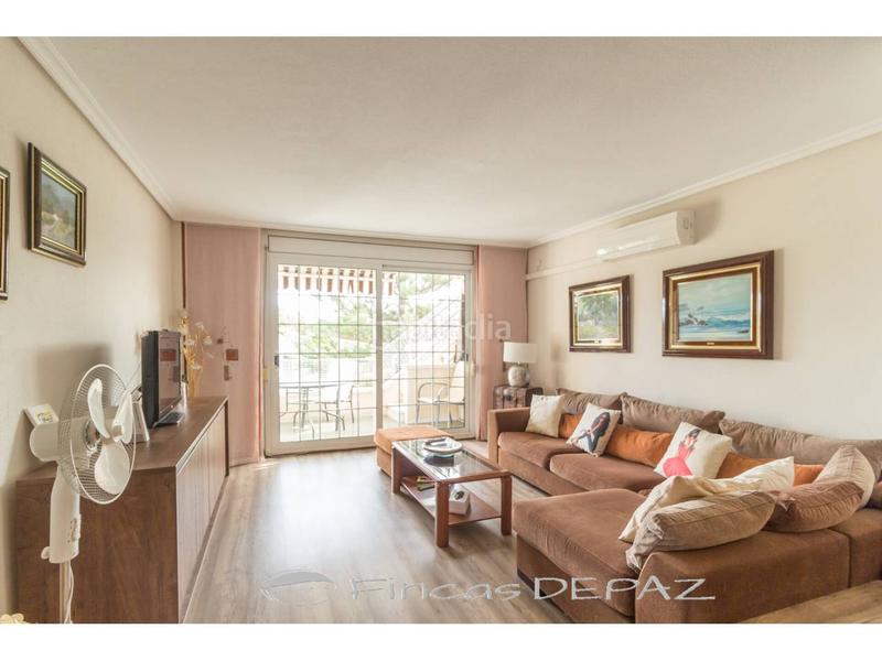 Foto 38ce6845-3838-42c4-bdfe-dae51a628f50. Apartamento ático con terraza playa en Lluminetes Castelldefels