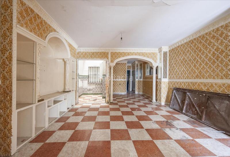 Foto 4e505b43-6a48-468e-8c7c-99f85d91ca26. Casa pareada casa en calle serenidad en Palmete Sevilla