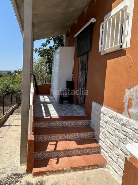 Foto bf12d366-96f9-43fe-aaf1-3479f7dba5e0. Casa chalet independiente en montserratdescubre tu nuevo hogar en este magnífico chalet urbano, con una parcela de 1.400m2 y 167m2 cons en Monserrat