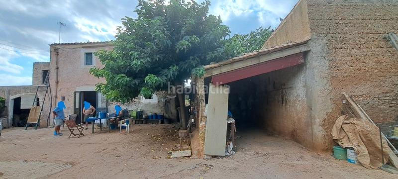 Foto ffee7400-43c3-475b-ab05-49dfa97a69a8. Casa dos fincas juntas edificables en Porreres