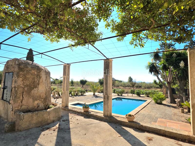 Foto 799fb822-7c60-4a53-85e8-3f350e5fd2fb. Lloguer masia amb xemeneia calefacció piscina a Consell