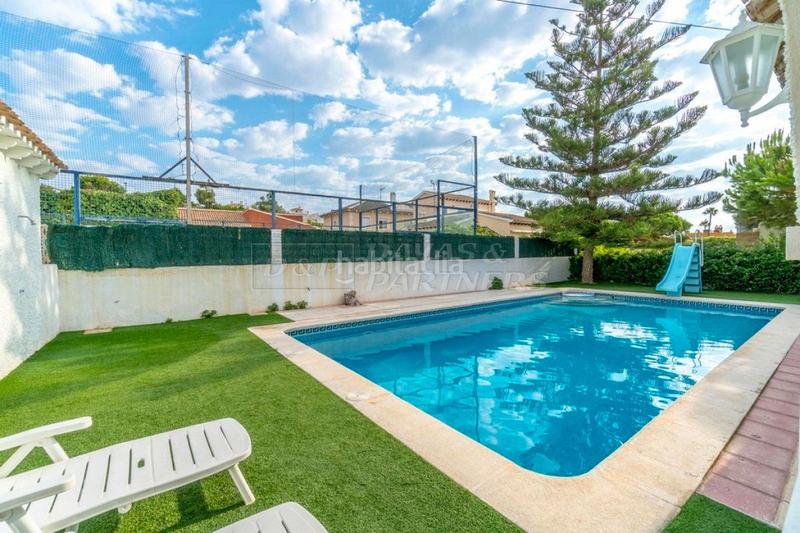 Foto 8b14be53-0725-4905-85e6-379d6e0e355d. Casa amb aparcament a Punta Prima Orihuela