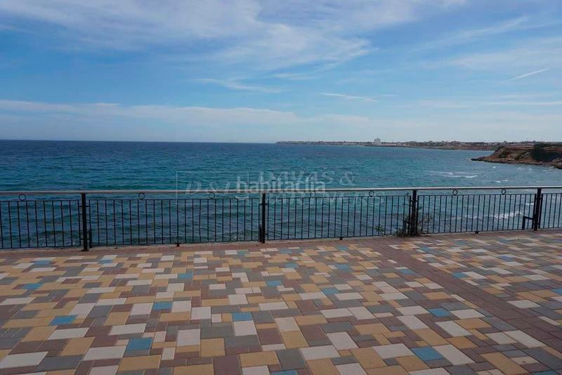 Foto 915b3a54-4b42-4051-9e2c-802bede4c2eb. Casa amb aparcament a Punta Prima Orihuela