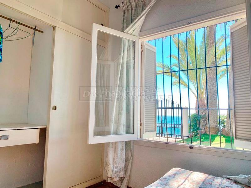 Foto e7dcbedc-16ec-4654-b853-146533f7a2fd. Casa amb aparcament a Punta Prima Orihuela