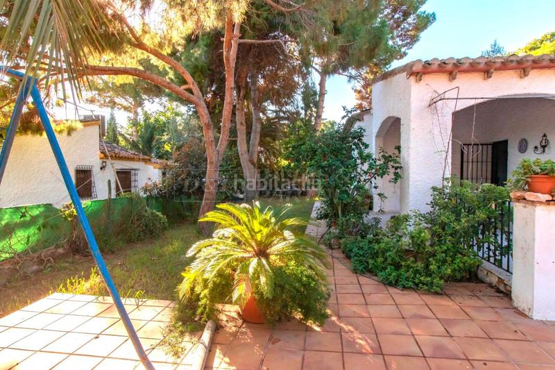 Foto 14c6bba4-ed83-42ec-a4d2-d0db8d84d441. Chalet dans Punta Prima Orihuela