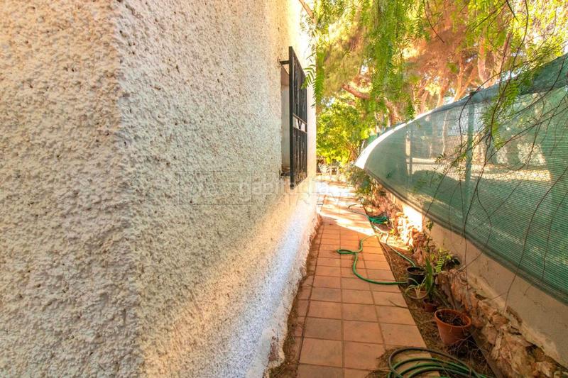 Foto 20803a9a-c388-4638-8f90-04de667e7c41. Chalet dans Punta Prima Orihuela