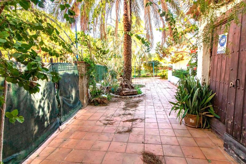 Foto 45ea4a16-4502-4a61-a6ca-a3f2e65c75a1. Chalet dans Punta Prima Orihuela