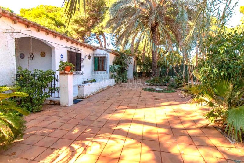 Foto f8bc8fb6-d20a-4f3e-8eef-450cb9ff5fd2. Chalet dans Punta Prima Orihuela