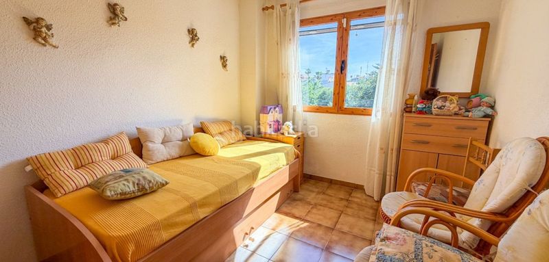 Foto 43bdde0a-1644-40e9-af7a-0b77729994bb. Casa adossada a Playa Flamenca Orihuela