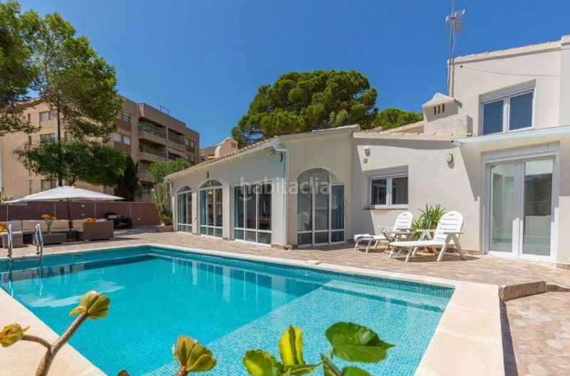Foto 190a27a0-884d-45b8-9eb9-f96c27d1a239. Xalet amb aparcament piscina a Punta Prima Orihuela