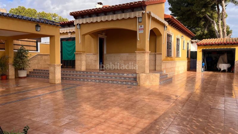 Foto d117ff9d-cd9b-46eb-93eb-805ece412688. Xalet amb aparcament piscina a Punta Prima Orihuela