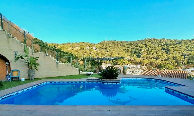 Foto 180e92b2-d9e6-49e2-9b4f-dac8369591ea. Chalet avec cheminée chauffage parking piscine dans Sant Fost de Campsentelles