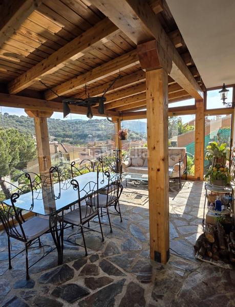 Foto 6b3b38a9-2f78-4860-9c86-21c299590eb4. Chalet avec cheminée chauffage parking piscine dans Sant Fost de Campsentelles