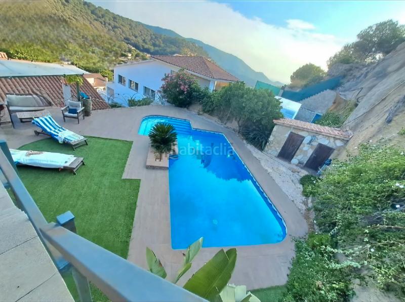 Foto f7061463-022d-4fda-9061-39e7a7b64203. Chalet avec cheminée chauffage parking piscine dans Sant Fost de Campsentelles