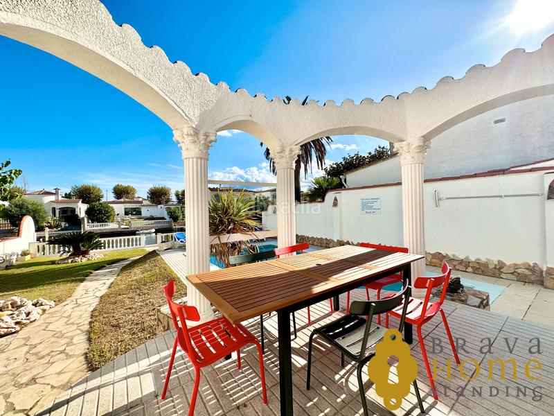 Foto 426221b3-1887-4654-ba91-15532692a899. Casa bonita casa al canal ancho con amarre de 12,50m2 en venta en Empuriabrava