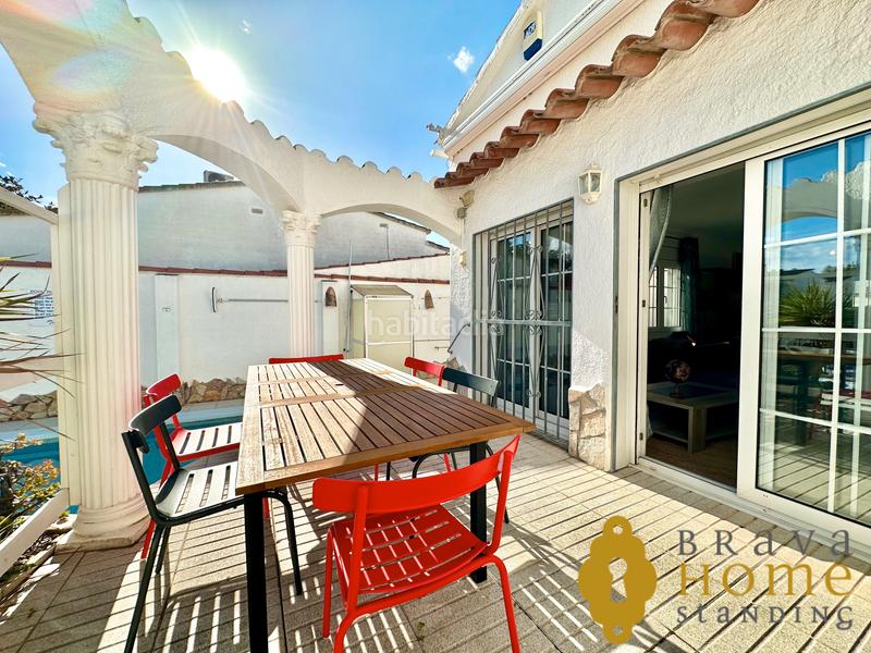 Foto 5fe43f88-253b-48b9-9358-22aa8b691ed1. Casa bonita casa al canal ancho con amarre de 12,50m2 en venta en Empuriabrava