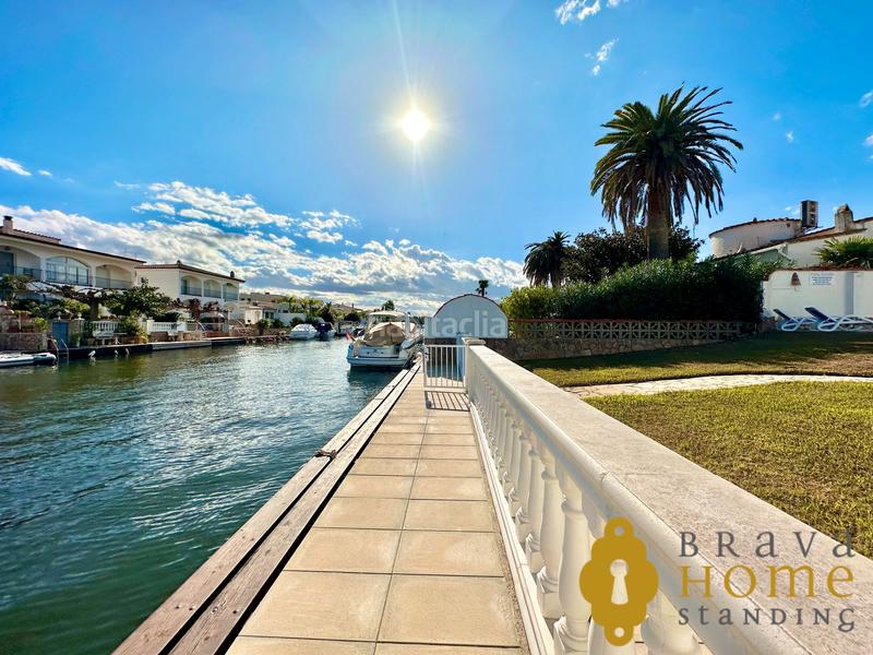 Foto 61804bdd-3a19-4163-a52f-3470e645c81b. Casa bonita casa al canal ancho con amarre de 12,50m2 en venta en Empuriabrava