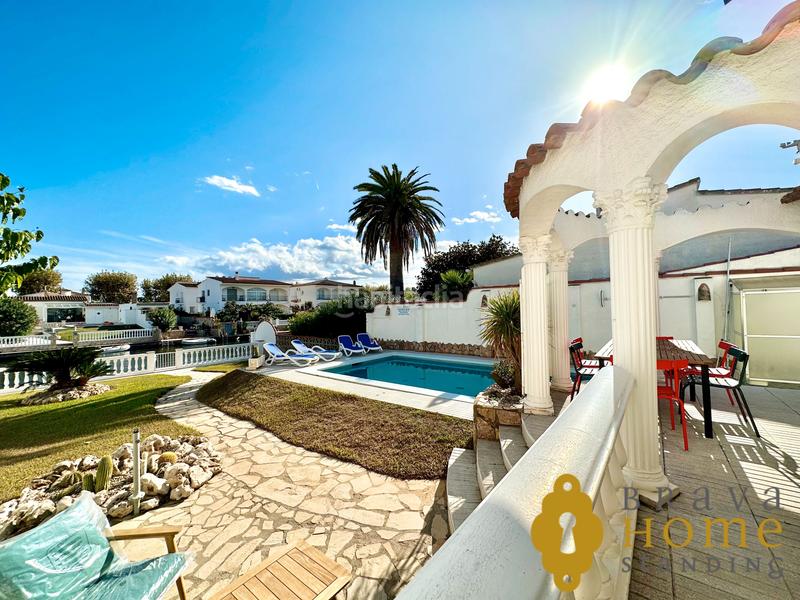 Foto 897a9e88-891d-4191-9199-f03447b7b963. Casa bonita casa al canal ancho con amarre de 12,50m2 en venta en Empuriabrava