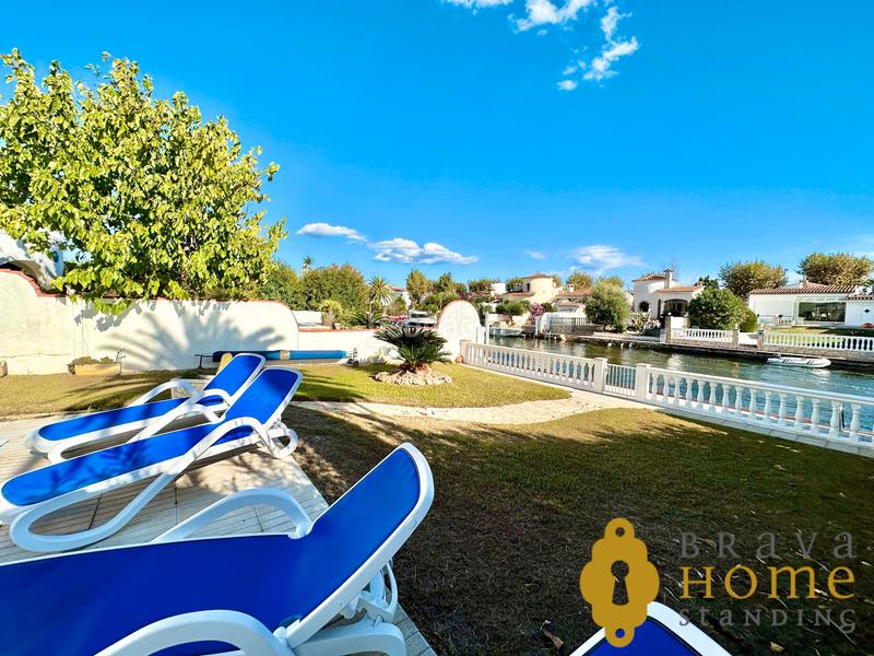 Foto 9d3a71a6-fef4-48a0-b1ed-96a39dbbc2ff. Casa bonita casa al canal ancho con amarre de 12,50m2 en venta en Empuriabrava