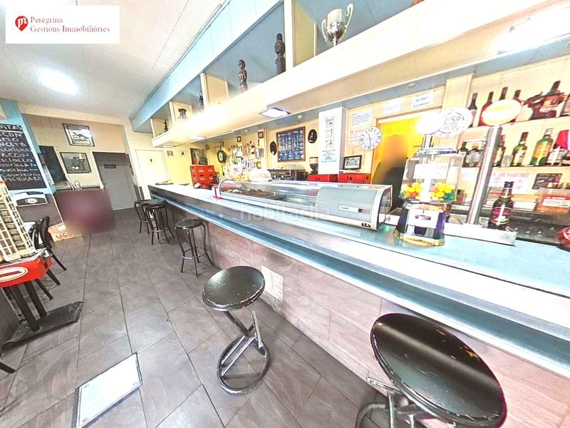 Foto aa5f17f1-ab57-41f2-ac41-b71f77de4dce. Local comercial amb calefacció a Singuerlín Santa Coloma de Gramenet
