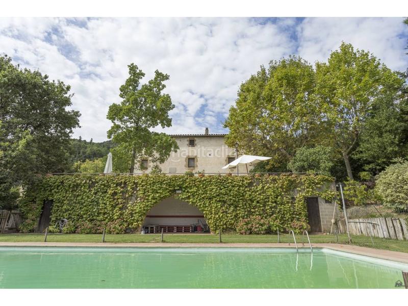 Foto 0401bf87-f1c8-481a-a985-af644b045fe0. Casa masía catalana del siglo xvii en Anglès