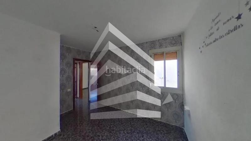 Foto 5e0dd11f-4a10-4e28-9d29-b36ad6b2bfe7. Piso en Can Mariner Santa Coloma de Gramenet