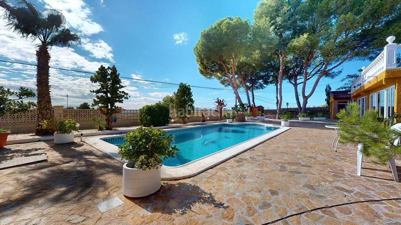 Foto b6d22878-d798-4fa0-97f4-9d28ded7d034. Chalet con riscaldamento parcheggio piscina in Peña de las Águilas Elche / Elx