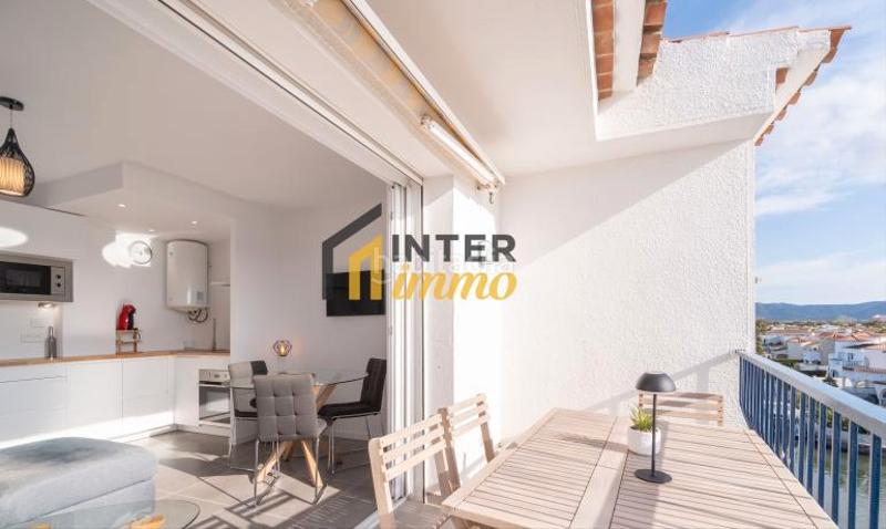 Foto 52b31ae7-1918-443e-9029-a75d55c1e1d0. Piso en carrer port empordà 85 precioso apartamento en la última planta con vistas al canal y amarre privado en Empuriabrava