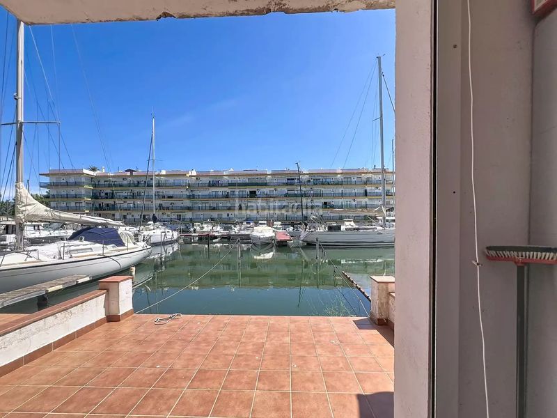 Foto 959c31d7-0d8a-4cf1-9758-95b727ef2054. Casa amb aparcament a Port Grec - Port Moxó Empuriabrava