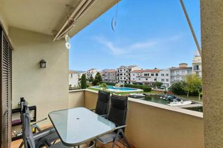 Flat  Port de sotavent. Port sotavent apartamento con vistas al canal y con piscina, par