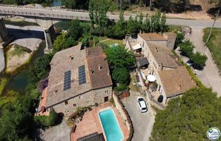 Casa  Calle cal barquer s/n. Excepcional complejo rural de 1.360 m frente al río fluvià en el