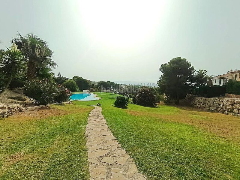 Foto 73d15286-eb1f-4b32-a1cc-51135129d120. Casa adossada amb piscina a Golf Bahía Finestrat