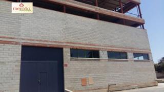 Nau industrial a Algorós - El Derramador. Edificio algoros