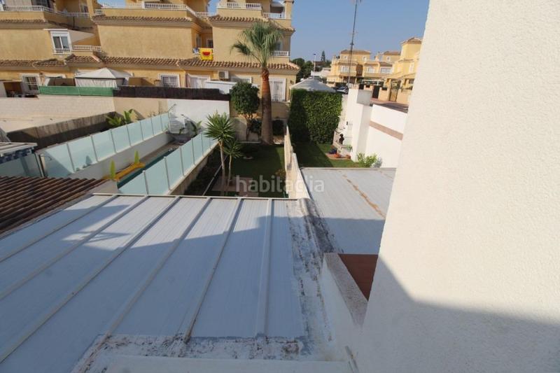 Foto 85688bb3-bd8b-496a-8226-48b57e1ddf4e. Reihenhaus mit parking in Los Balcones-Los Altos Torrevieja