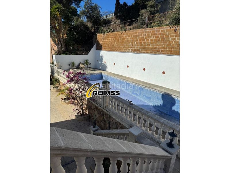 Foto c3d28cd5-888a-42df-bec9-a929cd50e71c. Casa amb aparcament a Canyelles Lloret de Mar