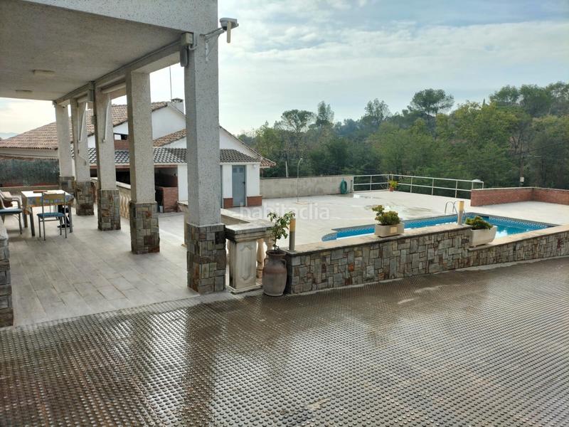 Foto 6ec8564d-2c5e-407f-a687-aafa9dffad27. Casa amb xemeneia calefacció aparcament piscina a Lliçà d´Amunt