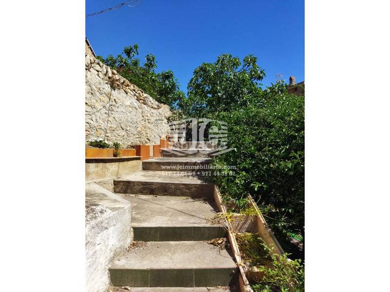 Foto 196ad8ce-f828-4090-87cd-8f44e0c643bd. Casa amb aparcament a Tivenys