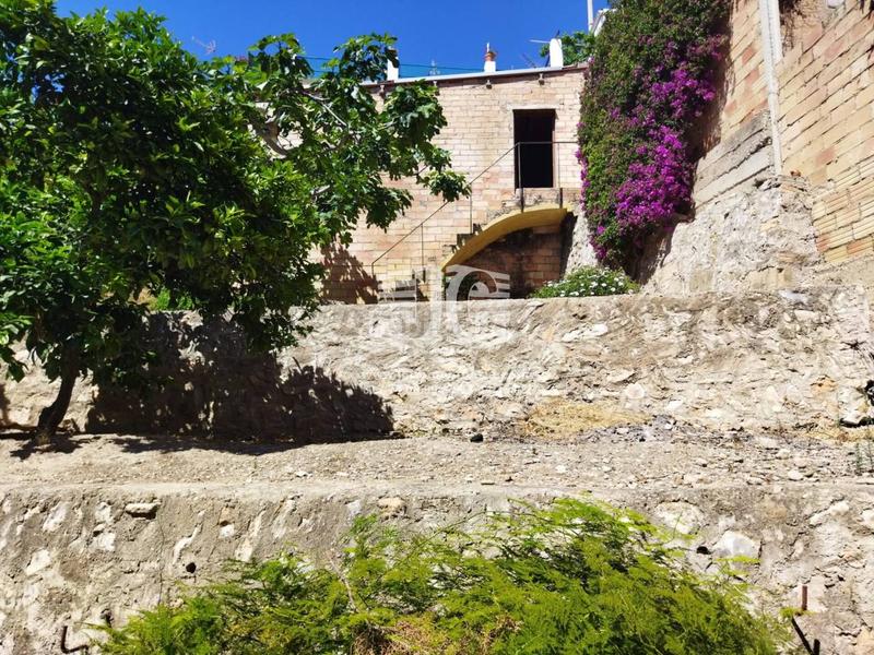 Foto 3ac8e9ad-5ff1-4a9d-b322-105636c4f0c2. Casa amb aparcament a Tivenys